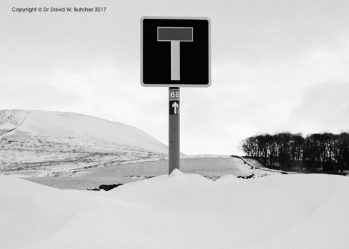 Snow covered road sign near Buxton, Peak District