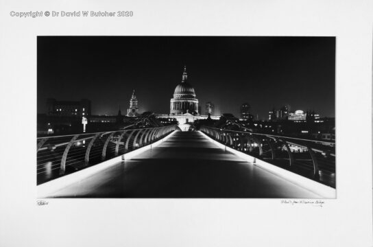 London St Paul's Cathedral from Millennium Bridge over River Thames at Night