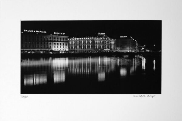 Geneva waterfront reflections at night, Switzerland