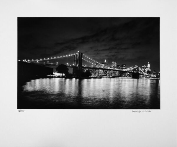New York Brooklyn Bridge, with Manhattan behind, from Brooklyn at Night, USA