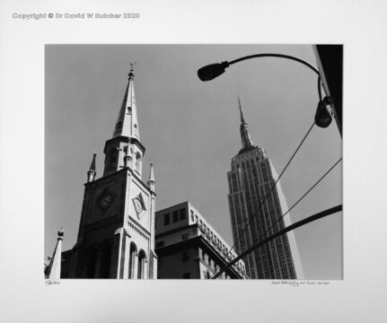 Empire State Building and Marble Collegiate church on 5th Avenue Manhattan, New York USA