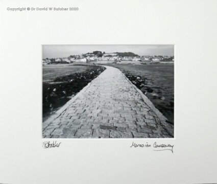 St Michael's Mount Causeway with Marazion in background at low tide, near Penzance, Cornwall.