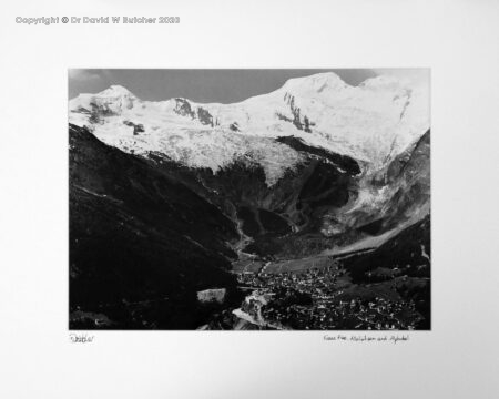 Saas Fee from above with Allalinhorn (left) and Alphubel (right) near Zermatt and Visp, Switzerland.