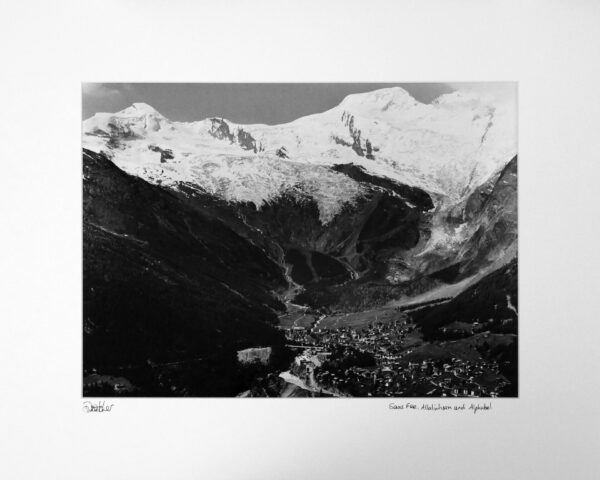 Saas Fee from above with Allalinhorn (left) and Alphubel (right) near Zermatt and Visp, Switzerland.