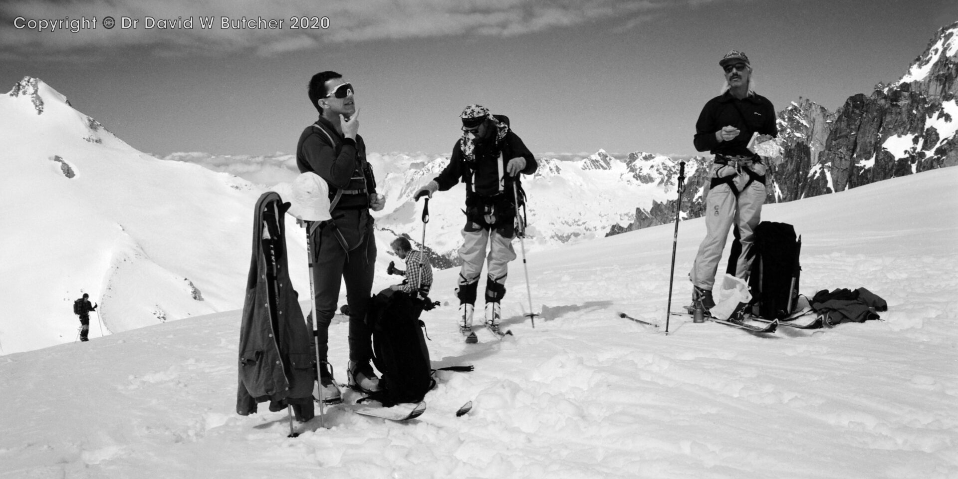 A short break at the top of the first steep section on Chardonnet Glacier, guide Jon de Montjoye on right, ski Haute Route Day 1