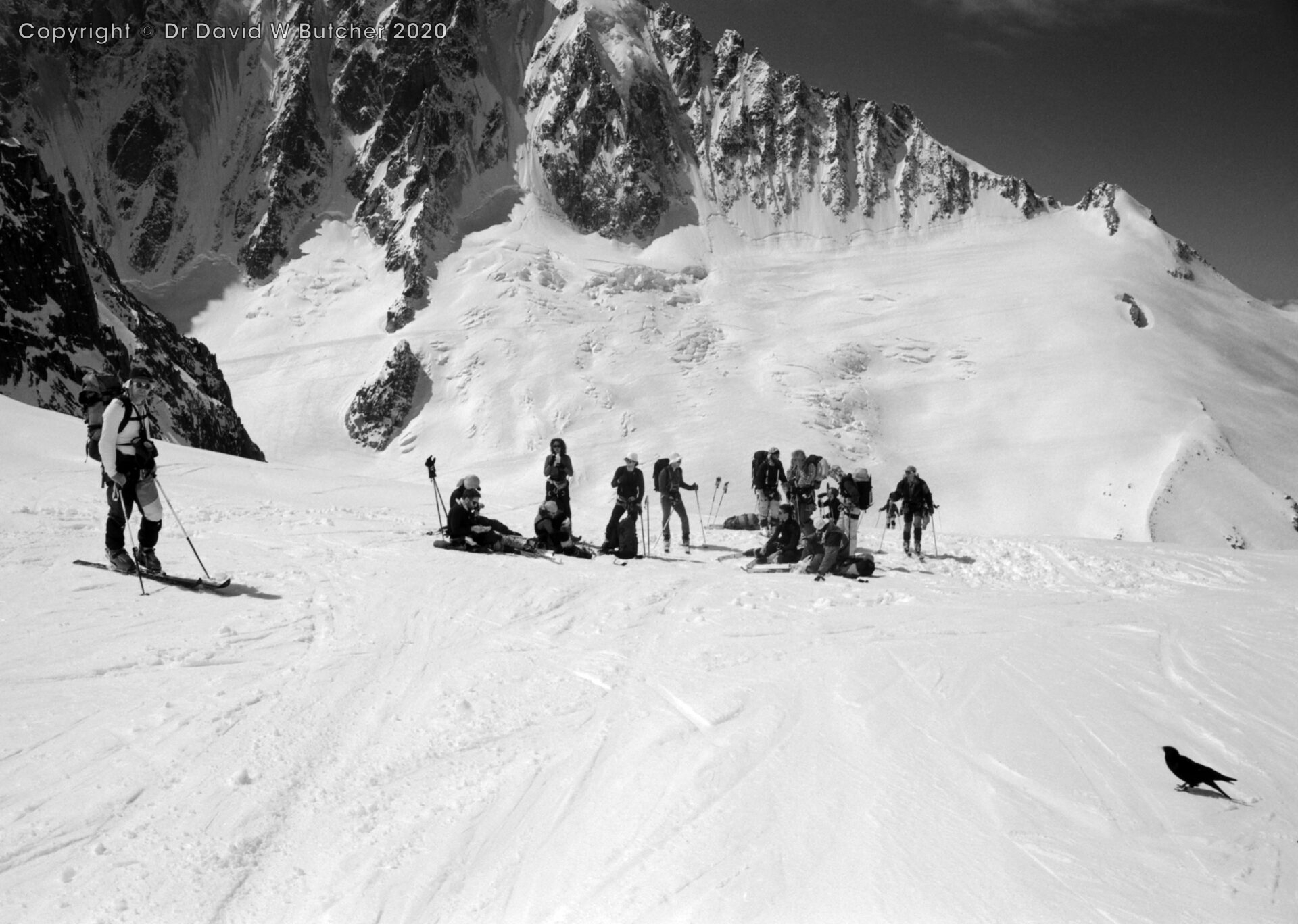 A short break at the top of the first steep section on Chardonnet Glacier, Grands Montets background right, ski Haute Route Day 1