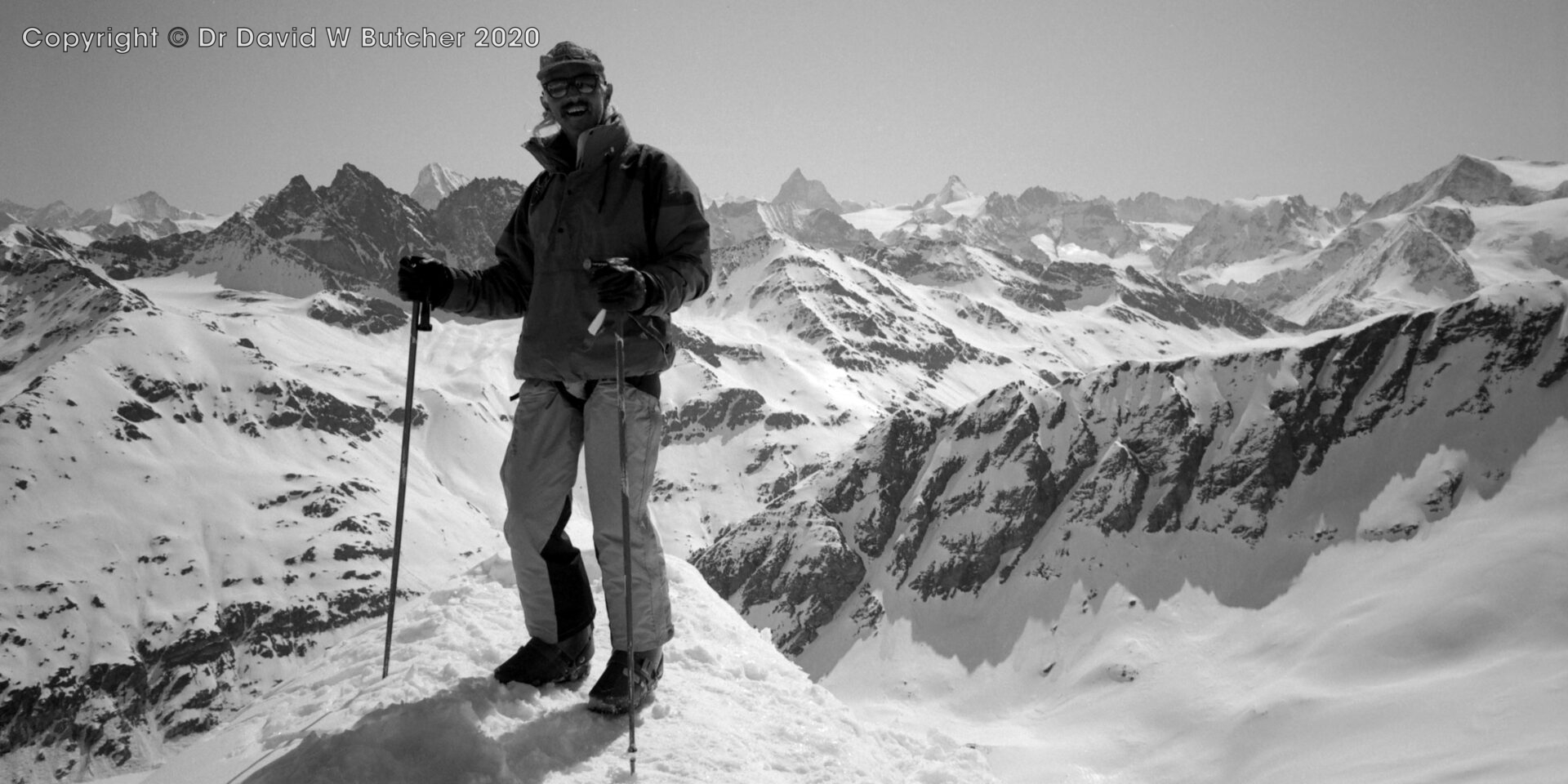 Jon de Montjoye guide, on Rosablanche near Verbier with Matterhorn in background right of centre and Dent Blanche to his left, ski Haute Route day 3