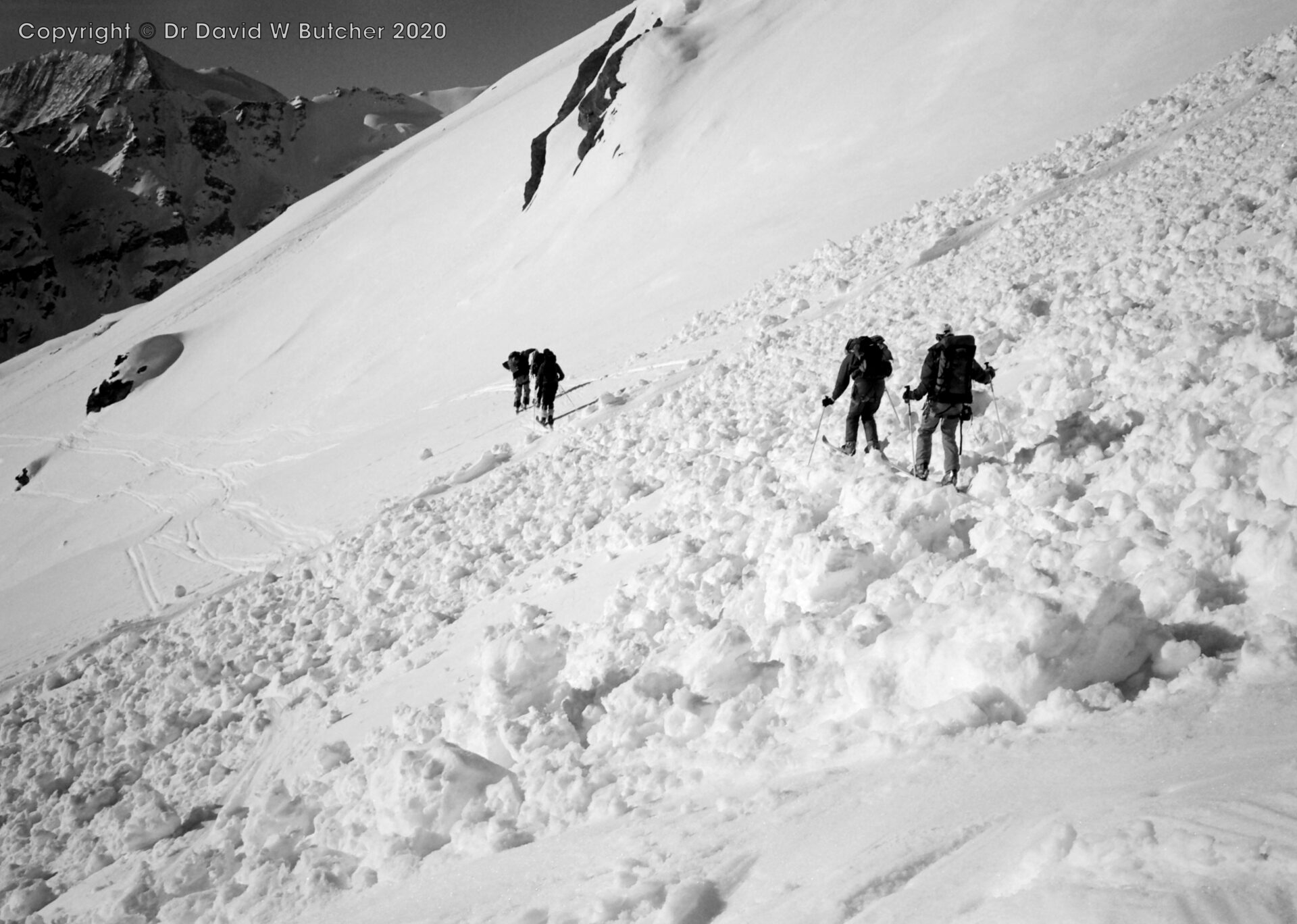 Crossing Avalanche Field Above Lac des Dix, ski Haute Route day 4