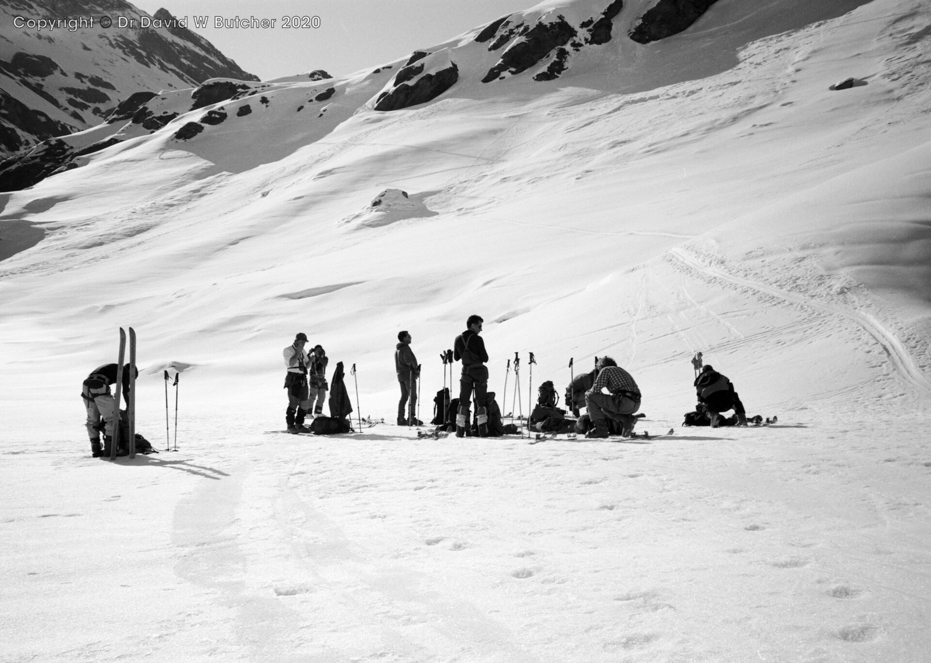 Our group having a break at south end of Lac des Dix, ski Haute Route day 4