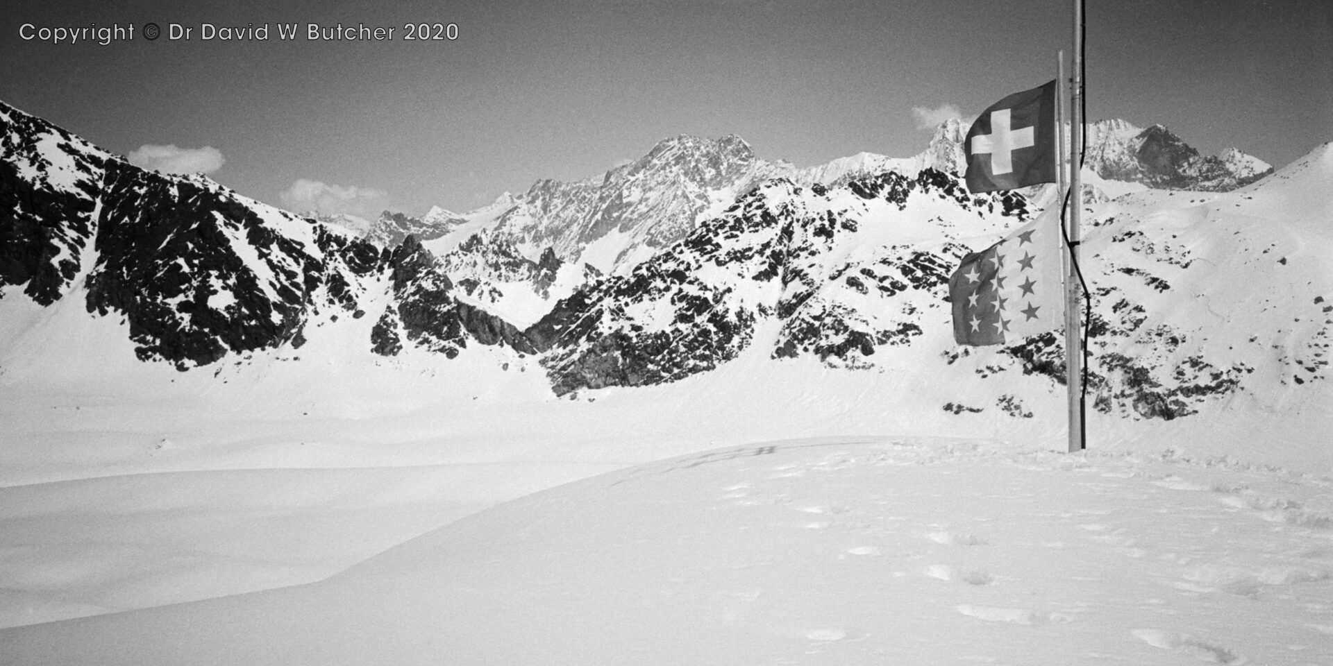 View east towards Dent Blanche (partly behind and left of flag) from Cabane des Dix, ski Haute Route day 4