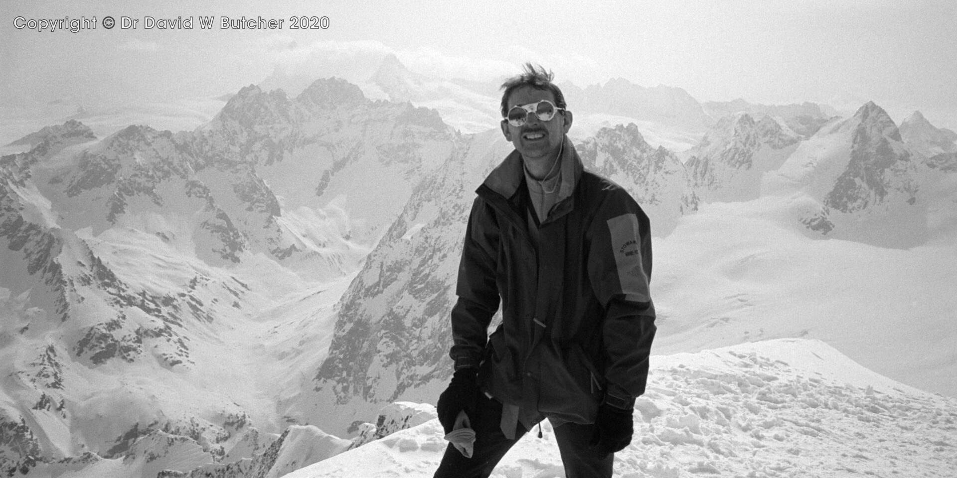 Dave Butcher on Pigne d'Arolla summit with Matterhorn and Dent d'Herens in background, ski Haute Route day 5