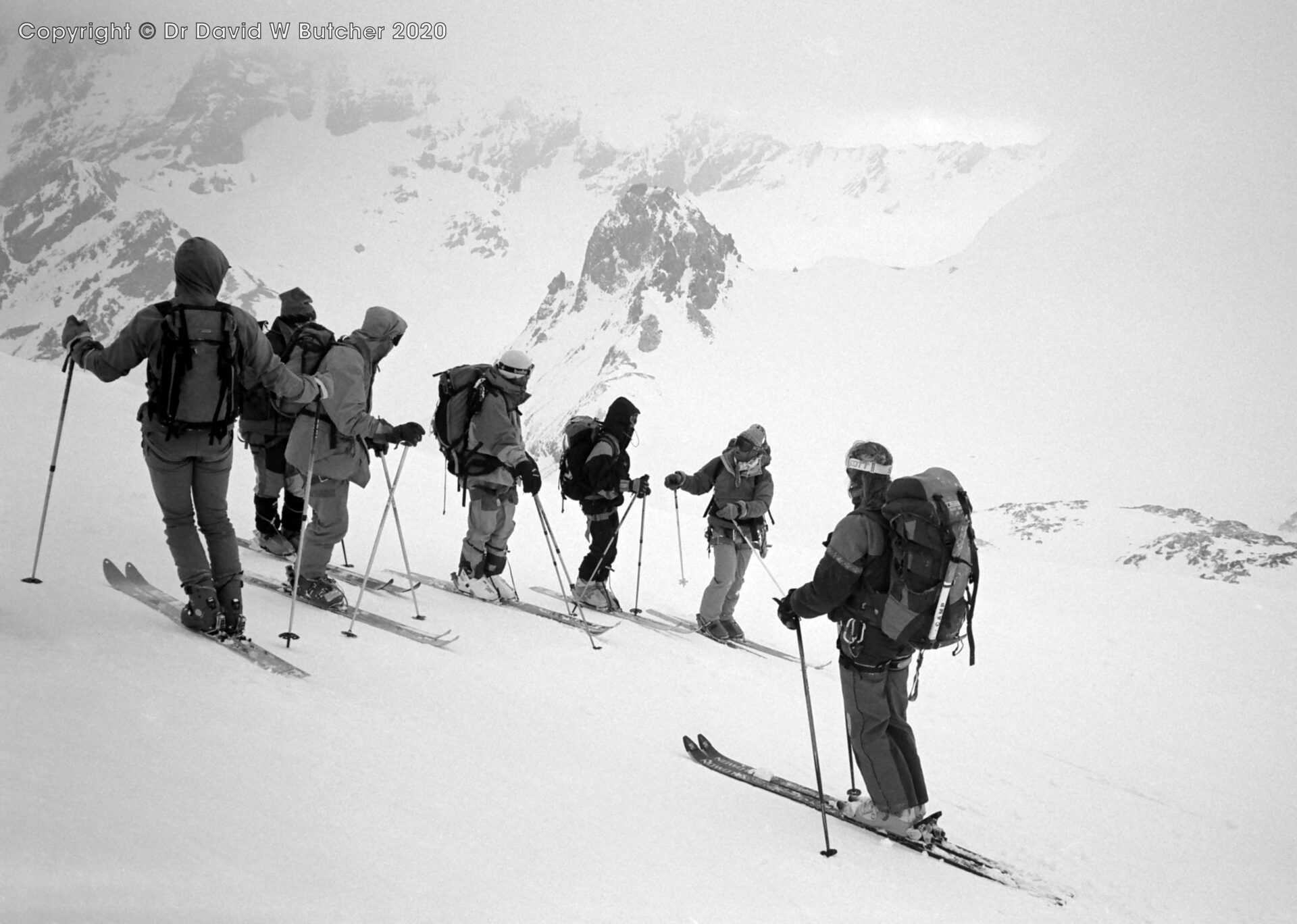 Jon de Montjoye instructing group before descent from Col de l'Eveque, Mark Rogerson left, Vaila Macdonald right, ski Haute Route day 6