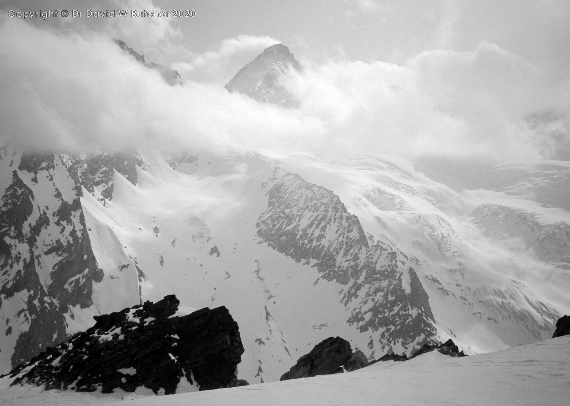 Dent d'Herens from Col du Mont Brule, Matterhorn hidden in clouds, ski Haute Route day 6