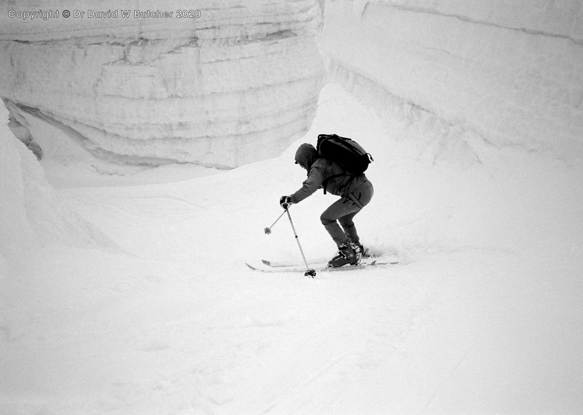 Skiing into Stockji Glacier crevasse for photos, ski Haute Route day 6